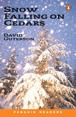 Snow falling on cedars
