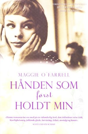 The hand that first held mine